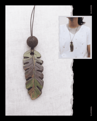Leaves Terracotta necklace on a white fabric background with a person wearing it inset.