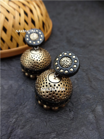 Black disc golden dot jhumkas